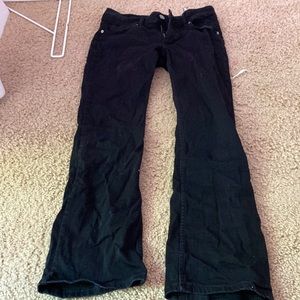 Low rise black boot cut jeans